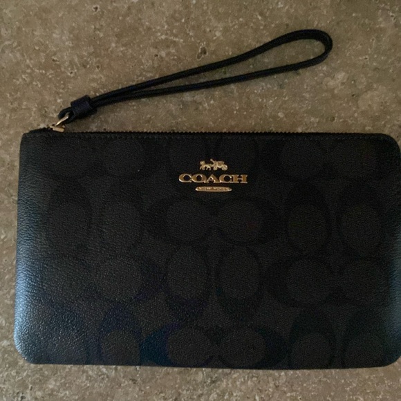 Coach Handbags - Coach large corner zip wristlet in canvas. Brown/black.New in original package